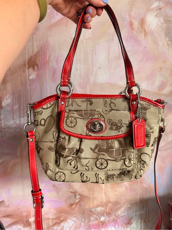 Coach Handbags - Coach Tan Signature Canvas Shoulder Bag with Red Leather Trim